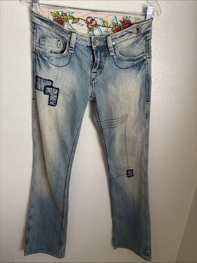 Light Wash Boot Cut Jeans with Embroidered Accents - Women